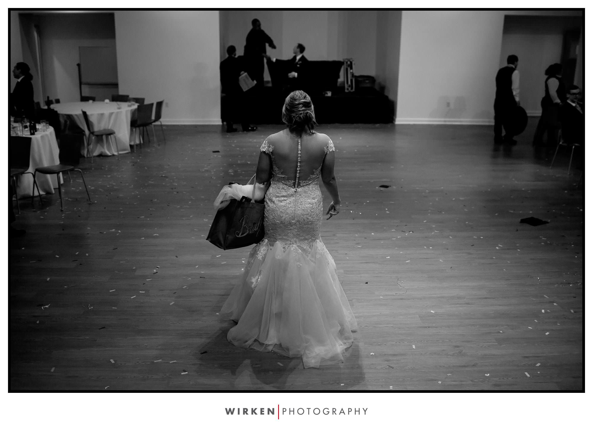 Leah exits from her wedding reception at the Gallery Event Center.
