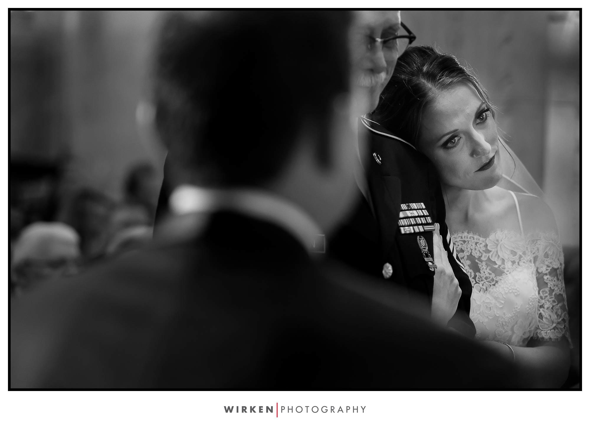 Bride holds her father before he hands her off at their Grand Hall wedding in Kansas City