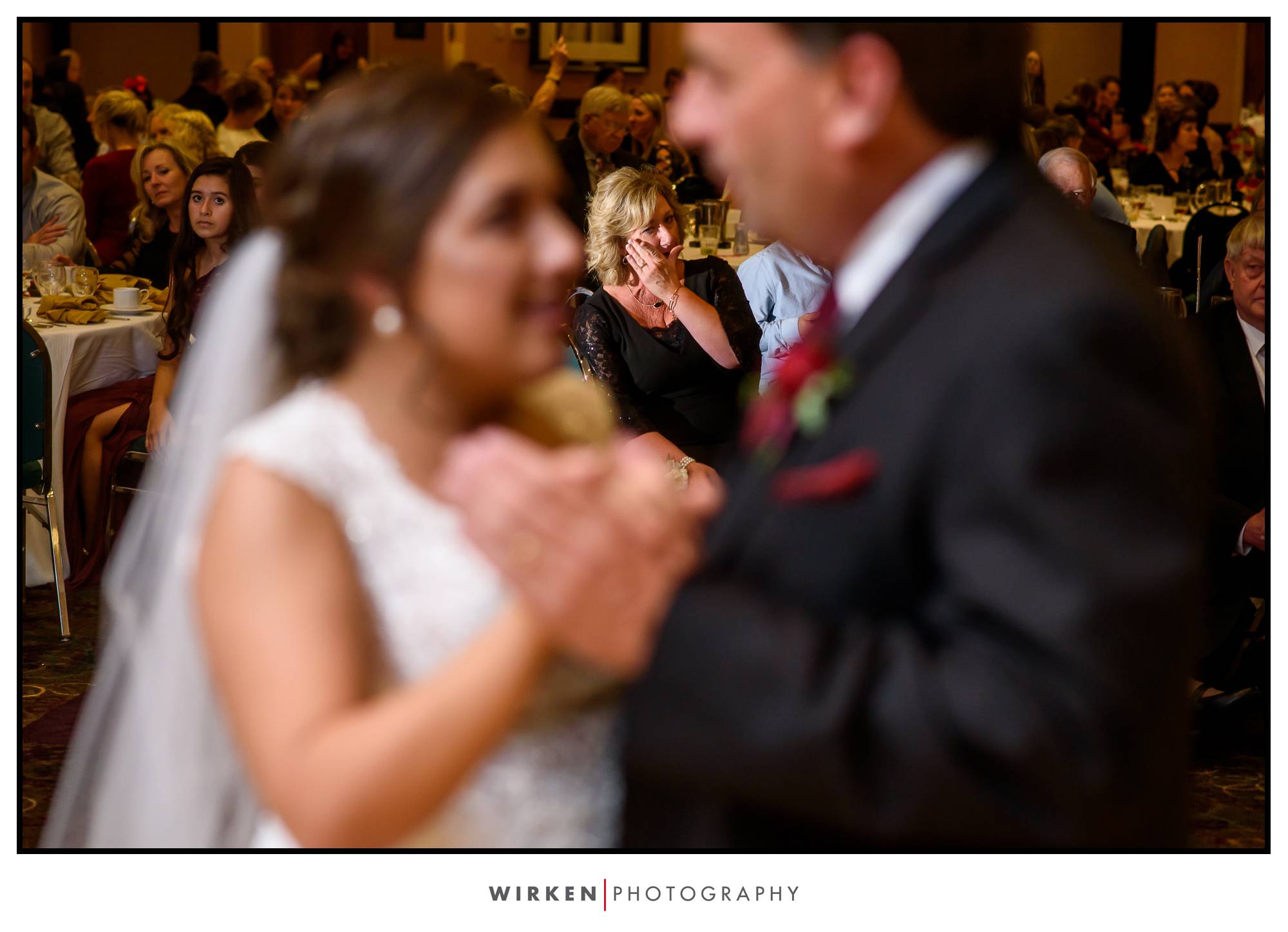 mother of the bride cries at father daughter dance at kansas city wedding